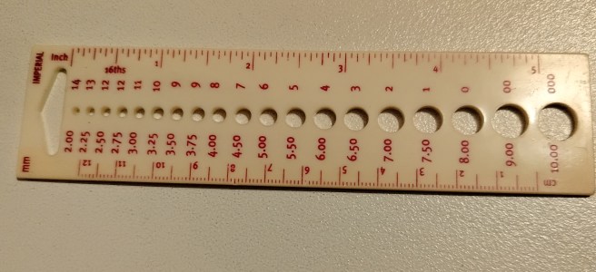 Picture of a knitting needle gauge.